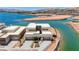 Stunning aerial view of a modern home with waterfront access to a serene lake at 1600 Pleasant Bay Ct, Henderson, NV 89011
