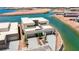 Modern home with 3 car garage sits waterfront on a peaceful lake at 1600 Pleasant Bay Ct, Henderson, NV 89011