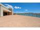 The backyard features a fence with views of the water and mountains at 1600 Pleasant Bay Ct, Henderson, NV 89011