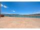 The backyard features a fence with expansive views of the mountains and water at 1600 Pleasant Bay Ct, Henderson, NV 89011