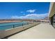Spacious balcony with scenic lake views, featuring a modern railing and ample room for outdoor seating at 1600 Pleasant Bay Ct, Henderson, NV 89011