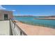 Balcony with lake view, offering a glimpse of a tranquil lake and surrounding landscapes for peaceful moments at 1600 Pleasant Bay Ct, Henderson, NV 89011