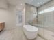 Elegant bathroom showcasing a freestanding tub and a glass-enclosed shower at 1600 Pleasant Bay Ct, Henderson, NV 89011