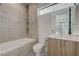 Well-appointed bathroom with tub, tiled shower, and contemporary vanity at 1600 Pleasant Bay Ct, Henderson, NV 89011