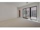 Expansive bedroom with access to outdoor area through sliding glass doors at 1600 Pleasant Bay Ct, Henderson, NV 89011