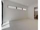 Bright bedroom featuring clean lines and door to bathroom at 1600 Pleasant Bay Ct, Henderson, NV 89011