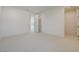 Bright bedroom featuring neutral carpeting, recessed lighting, and multiple entry doors at 1600 Pleasant Bay Ct, Henderson, NV 89011
