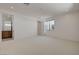 This bedroom offers neutral carpeting, bright white walls, and modern recessed lighting at 1600 Pleasant Bay Ct, Henderson, NV 89011