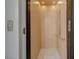 A residential elevator featuring light wood paneled walls and metal trim at 1600 Pleasant Bay Ct, Henderson, NV 89011
