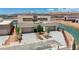 Modern waterfront home with a two-car garage and well-maintained landscaping at 1600 Pleasant Bay Ct, Henderson, NV 89011