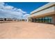 Exterior view of the rear of the home and the expansive backyard at 1600 Pleasant Bay Ct, Henderson, NV 89011