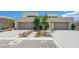 Contemporary home featuring a two-car garage and minimalist landscaping at 1600 Pleasant Bay Ct, Henderson, NV 89011