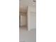 Hallway featuring neutral carpet and an open doorway at 1600 Pleasant Bay Ct, Henderson, NV 89011