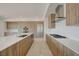 Modern kitchen with wood cabinets, stainless steel appliances and range hood at 1600 Pleasant Bay Ct, Henderson, NV 89011