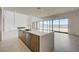 Modern kitchen with island sink, wood cabinetry, and lots of natural light at 1600 Pleasant Bay Ct, Henderson, NV 89011