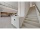 Open-concept home showcasing staircase and modern kitchen at 1600 Pleasant Bay Ct, Henderson, NV 89011