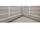 Walk-in pantry with ample shelving and tiled flooring at 1600 Pleasant Bay Ct, Henderson, NV 89011
