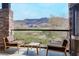 Breathtaking balcony views featuring golf course panoramas and distant cityscapes, offering the perfect blend of recreation and urban life at 1725 Cypress Manor Dr, Henderson, NV 89012