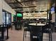 Upscale bar area with stylish seating, ambient lighting, and a fully stocked display, ideal for entertaining at 1725 Cypress Manor Dr, Henderson, NV 89012