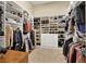 Spacious walk-in closet with custom shelving for clothes, shoes, and accessories at 1725 Cypress Manor Dr, Henderson, NV 89012