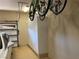 Garage with storage cabinets, an automatic door, overhead lighting, and parking for one car and bikes at 1725 Cypress Manor Dr, Henderson, NV 89012