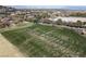 Expansive golf course driving range with neatly arranged tee positions in a luxury community at 1725 Cypress Manor Dr, Henderson, NV 89012