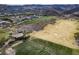 Scenic aerial view of the golf course, featuring lush greens and beautiful sand traps at 1725 Cypress Manor Dr, Henderson, NV 89012