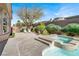 Backyard oasis featuring a pool, spa, patio, and privacy landscaping at 1725 Cypress Manor Dr, Henderson, NV 89012