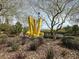 Artistic community sculpture set among trees and landscaping, adding a touch of creativity and visual interest at 1725 Cypress Manor Dr, Henderson, NV 89012