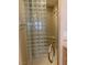 Features a glass block shower wall, enhancing natural light and privacy with a corner seat at 1725 Cypress Manor Dr, Henderson, NV 89012