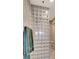 Modern bathroom showcases a glass block shower wall, enhancing natural light and privacy at 1725 Cypress Manor Dr, Henderson, NV 89012