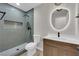 Modern bathroom with a tiled shower, new toilet, and updated vanity at 177 Rocky Star St, Henderson, NV 89012
