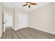 Bedroom featuring hardwood floors, closet, and neutral color scheme at 177 Rocky Star St, Henderson, NV 89012