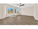Spacious bedroom boasts beautiful wood-look floors, multiple windows, and ample natural light at 177 Rocky Star St, Henderson, NV 89012