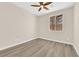 Cozy bedroom with wood floors, neutral walls, and a ceiling fan at 177 Rocky Star St, Henderson, NV 89012