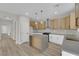 Modern kitchen with stainless appliances, center island, and bright lighting at 177 Rocky Star St, Henderson, NV 89012