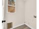 Functional laundry room with light walls and flooring at 177 Rocky Star St, Henderson, NV 89012