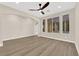 Expansive living area filled with natural light and wood flooring at 177 Rocky Star St, Henderson, NV 89012