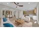 Bright and airy living room showcasing an open layout with seamless flow into the modern kitchen at 177 Rocky Star St, Henderson, NV 89012