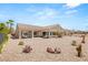 Landscaped backyard offering a relaxing outdoor area and beautiful views of the surrounding area at 2069 Colvin Run Dr, Henderson, NV 89052