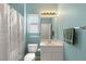 Updated bath featuring a shower and tub combo, modern vanity and lighting at 2069 Colvin Run Dr, Henderson, NV 89052