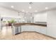 Bright kitchen features recessed lighting, white cabinetry, stainless steel appliances, and tile floors at 2069 Colvin Run Dr, Henderson, NV 89052