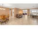 Open-plan living room featuring tile flooring and natural light at 2069 Colvin Run Dr, Henderson, NV 89052