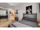 This bedroom has neutral walls, a mirror closet, and cool decorative touches at 2074 Sutton Way, Henderson, NV 89074