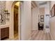 The hallway offers access to the bathroom and bedrooms, along with stylish flooring at 2074 Sutton Way, Henderson, NV 89074