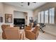 This living room offers comfortable seating and a dedicated entertainment area at 2074 Sutton Way, Henderson, NV 89074