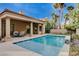 Backyard pool with patio and desert landscaping at 2074 Sutton Way, Henderson, NV 89074