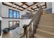 Bright bedroom with coffered ceiling, french doors to the outside, and second-story loft access at 2160 Pueblo Cir, Las Vegas, NV 89169