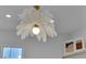 Close-up of unique light fixture in closet and shelving for storage at 2160 Pueblo Cir, Las Vegas, NV 89169
