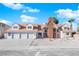 Charming two-story home with a three-car garage and desert landscaping at 2160 Pueblo Cir, Las Vegas, NV 89169